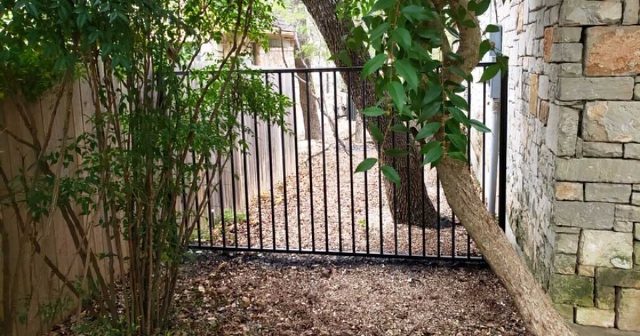 Side of house fence gate project in San Antonio TX.